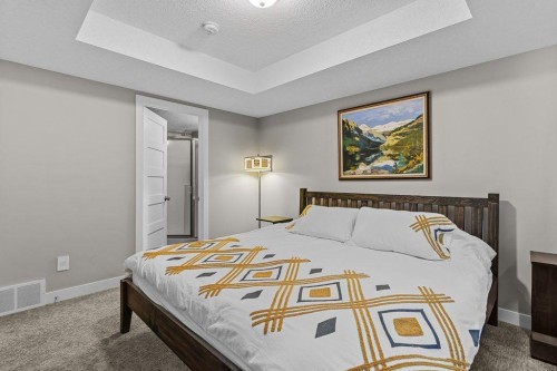 2-817 4Th Street, Canmore, AB - Indoor Photo Showing Bedroom