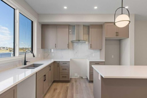 123 Montane Link Se, High River, AB - Indoor Photo Showing Kitchen With Double Sink With Upgraded Kitchen