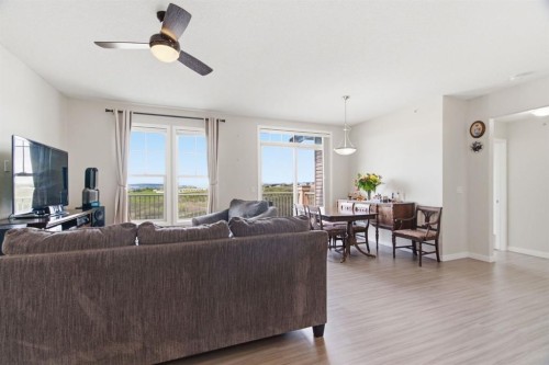 408-207 Sunset Drive, Cochrane, AB - Indoor Photo Showing Living Room