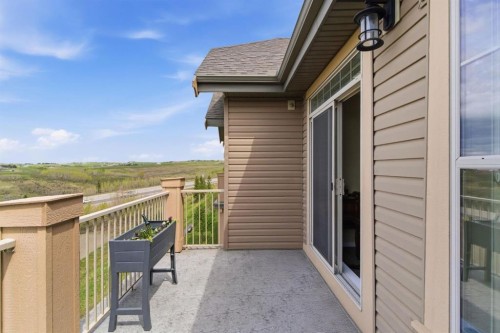 408-207 Sunset Drive, Cochrane, AB - Outdoor With Exterior
