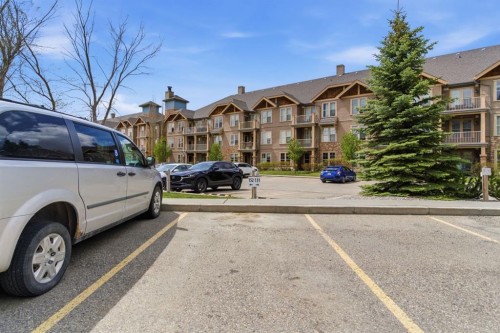 408-207 Sunset Drive, Cochrane, AB - Outdoor With Balcony