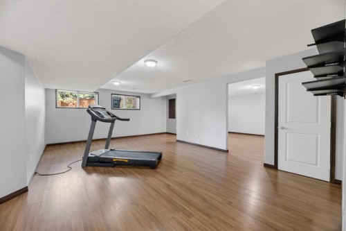107 Westridge Place, Didsbury, AB - Indoor Photo Showing Gym Room