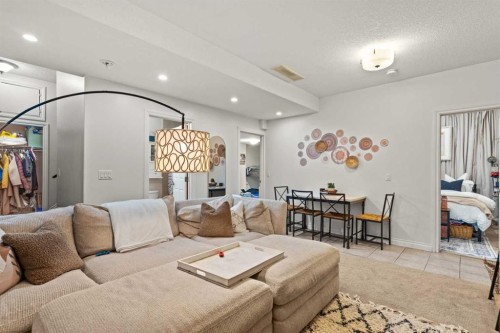 137 Copperleaf Bay Se, Calgary, AB - Indoor Photo Showing Living Room