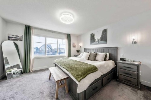 29 Sundown Close, Cochrane, AB - Indoor Photo Showing Bedroom