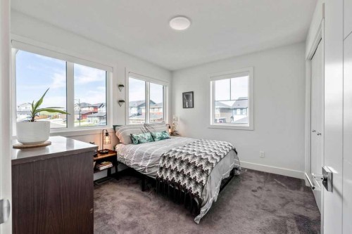 29 Sundown Close, Cochrane, AB - Indoor Photo Showing Bedroom