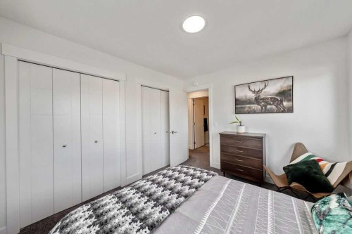29 Sundown Close, Cochrane, AB - Indoor Photo Showing Bedroom