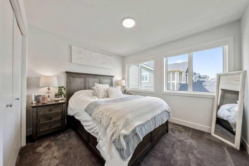 29 Sundown Close, Cochrane, AB - Indoor Photo Showing Bedroom