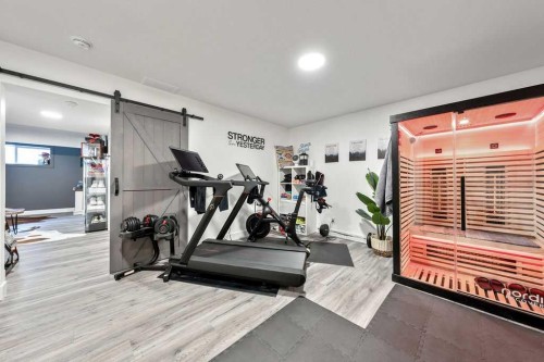29 Sundown Close, Cochrane, AB - Indoor Photo Showing Gym Room