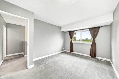 23-6915 Ranchview Drive Nw, Calgary, AB - Indoor Photo Showing Other Room