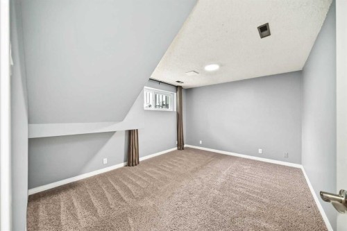 23-6915 Ranchview Drive Nw, Calgary, AB - Indoor Photo Showing Other Room