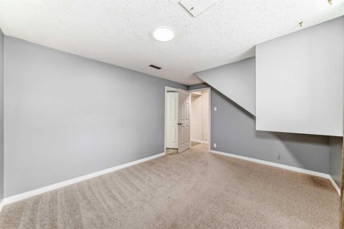 23-6915 Ranchview Drive Nw, Calgary, AB - Indoor Photo Showing Other Room