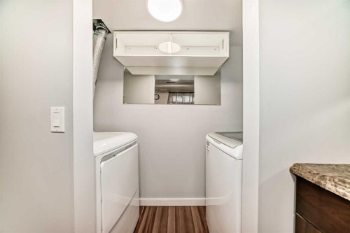 23-6915 Ranchview Drive Nw, Calgary, AB - Indoor Photo Showing Laundry Room