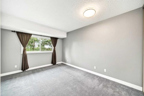 23-6915 Ranchview Drive Nw, Calgary, AB - Indoor Photo Showing Other Room