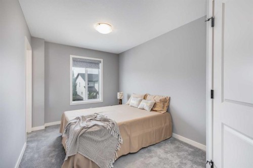 247 Hillcrest Heights Sw, Airdrie, AB - Indoor Photo Showing Bedroom