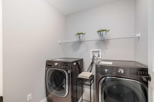 247 Hillcrest Heights Sw, Airdrie, AB - Indoor Photo Showing Laundry Room
