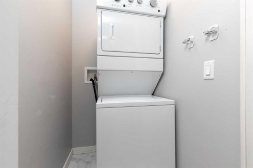 247 Hillcrest Heights Sw, Airdrie, AB - Indoor Photo Showing Laundry Room