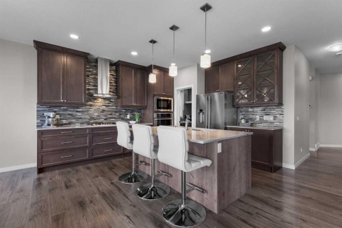 247 Hillcrest Heights Sw, Airdrie, AB - Indoor Photo Showing Kitchen With Upgraded Kitchen