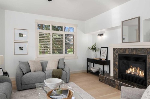 2341 6 Avenue Nw, Calgary, AB - Indoor Photo Showing Living Room With Fireplace
