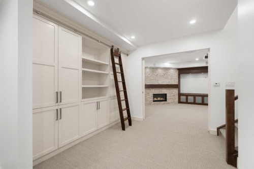 2341 6 Avenue Nw, Calgary, AB - Indoor Photo Showing Other Room With Fireplace