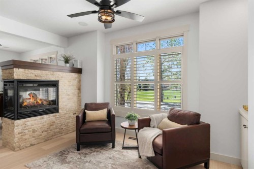 2341 6 Avenue Nw, Calgary, AB - Indoor Photo Showing Living Room With Fireplace