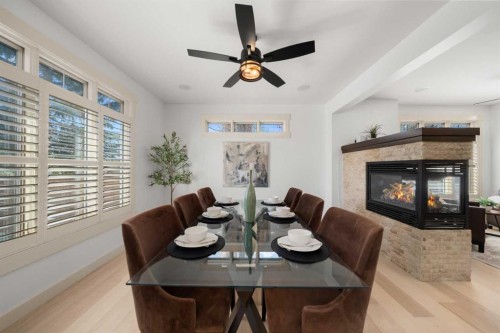 2341 6 Avenue Nw, Calgary, AB - Indoor Photo Showing Dining Room With Fireplace