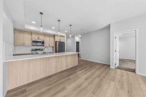 6207-20295 Seton Way Se, Calgary, AB - Indoor Photo Showing Kitchen With Upgraded Kitchen