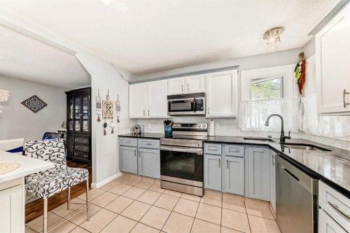 43 Beaconsfield Way Nw, Calgary, AB - Indoor Photo Showing Kitchen With Stainless Steel Kitchen