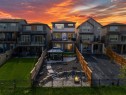 152 Cranbrook Gardens Se, Calgary, AB  - Outdoor With Balcony With Facade 