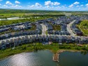 152 Cranbrook Gardens Se, Calgary, AB  - Outdoor With Body Of Water With View 