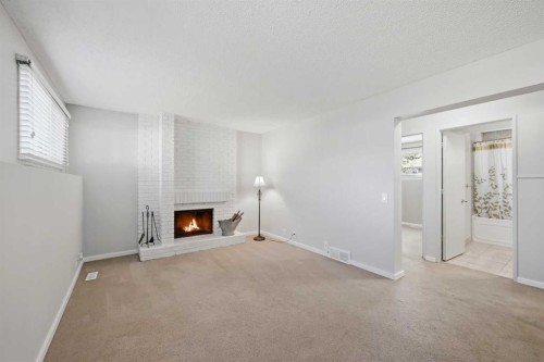 156 Templeview Place Ne, Calgary, AB - Indoor With Fireplace