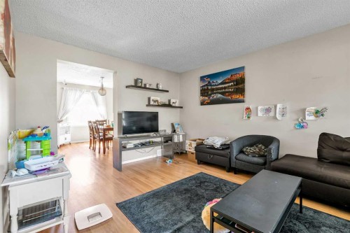 140 Dalhousie Road Nw, Calgary, AB - Indoor Photo Showing Living Room