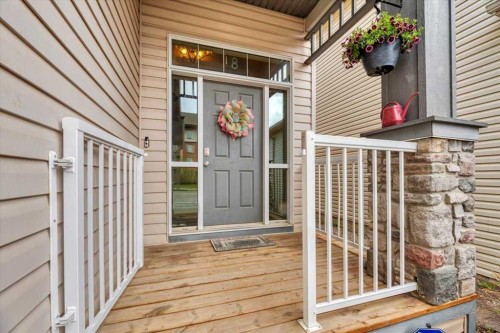 8 Sunset Square, Cochrane, AB - Outdoor With Deck Patio Veranda With Exterior