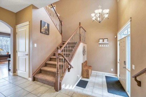 8 Sunset Square, Cochrane, AB - Indoor Photo Showing Other Room