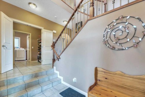 8 Sunset Square, Cochrane, AB - Indoor Photo Showing Other Room