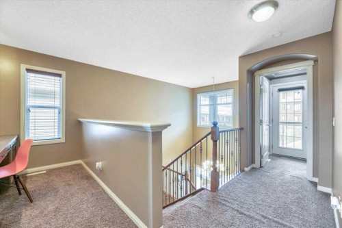 8 Sunset Square, Cochrane, AB - Indoor Photo Showing Other Room