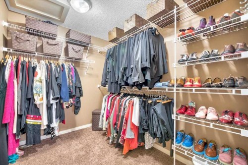 8 Sunset Square, Cochrane, AB - Indoor With Storage