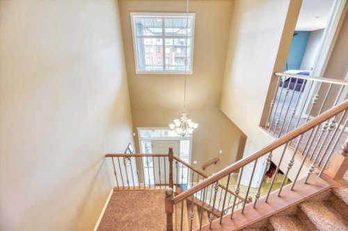 8 Sunset Square, Cochrane, AB - Indoor Photo Showing Other Room