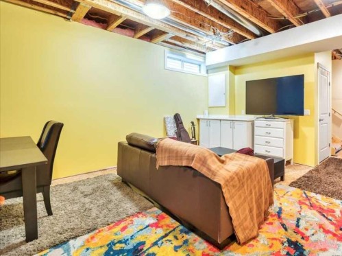 8 Sunset Square, Cochrane, AB - Indoor Photo Showing Basement