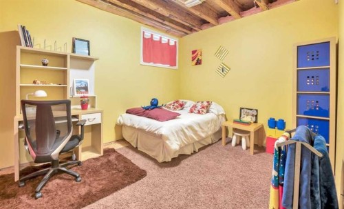 8 Sunset Square, Cochrane, AB - Indoor Photo Showing Other Room
