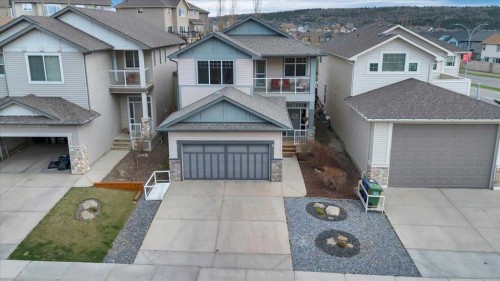 8 Sunset Square, Cochrane, AB - Outdoor With Facade