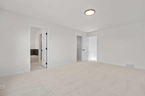 571 Buffaloberry Manor Se, Calgary, AB - Indoor Photo Showing Other Room