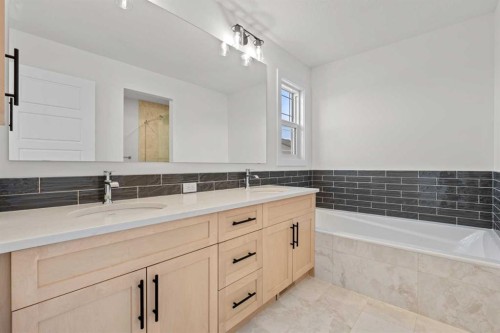 571 Buffaloberry Manor Se, Calgary, AB - Indoor Photo Showing Bathroom