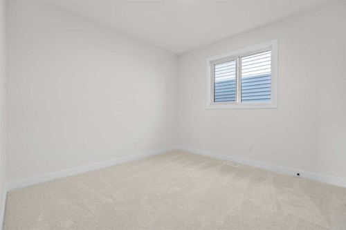 571 Buffaloberry Manor Se, Calgary, AB - Indoor Photo Showing Other Room