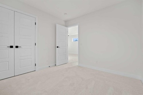 571 Buffaloberry Manor Se, Calgary, AB - Indoor Photo Showing Other Room