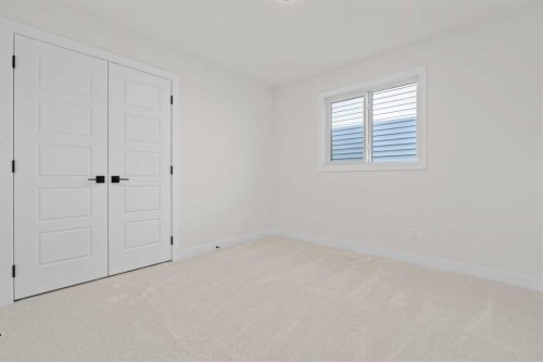 571 Buffaloberry Manor Se, Calgary, AB - Indoor Photo Showing Other Room