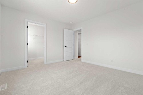 571 Buffaloberry Manor Se, Calgary, AB - Indoor Photo Showing Other Room