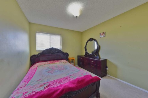 125 Costa Mesa Close Ne, Calgary, AB - Indoor Photo Showing Bedroom