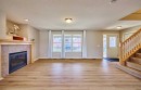 383 Prestwick Close Se, Calgary, AB  - Indoor Photo Showing Living Room With Fireplace 