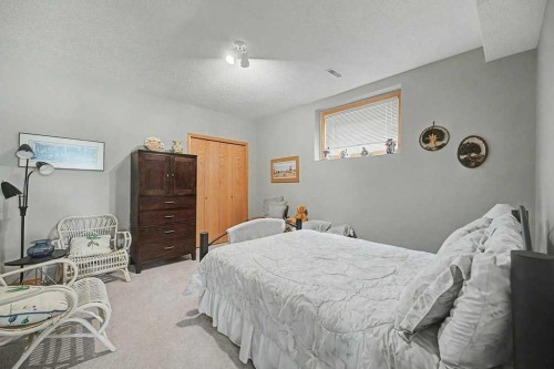 18 Prominence View Sw, Calgary, AB - Indoor Photo Showing Bedroom