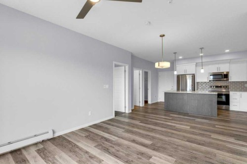 323-4150 Seton Drive Se, Calgary, AB - Indoor Photo Showing Kitchen